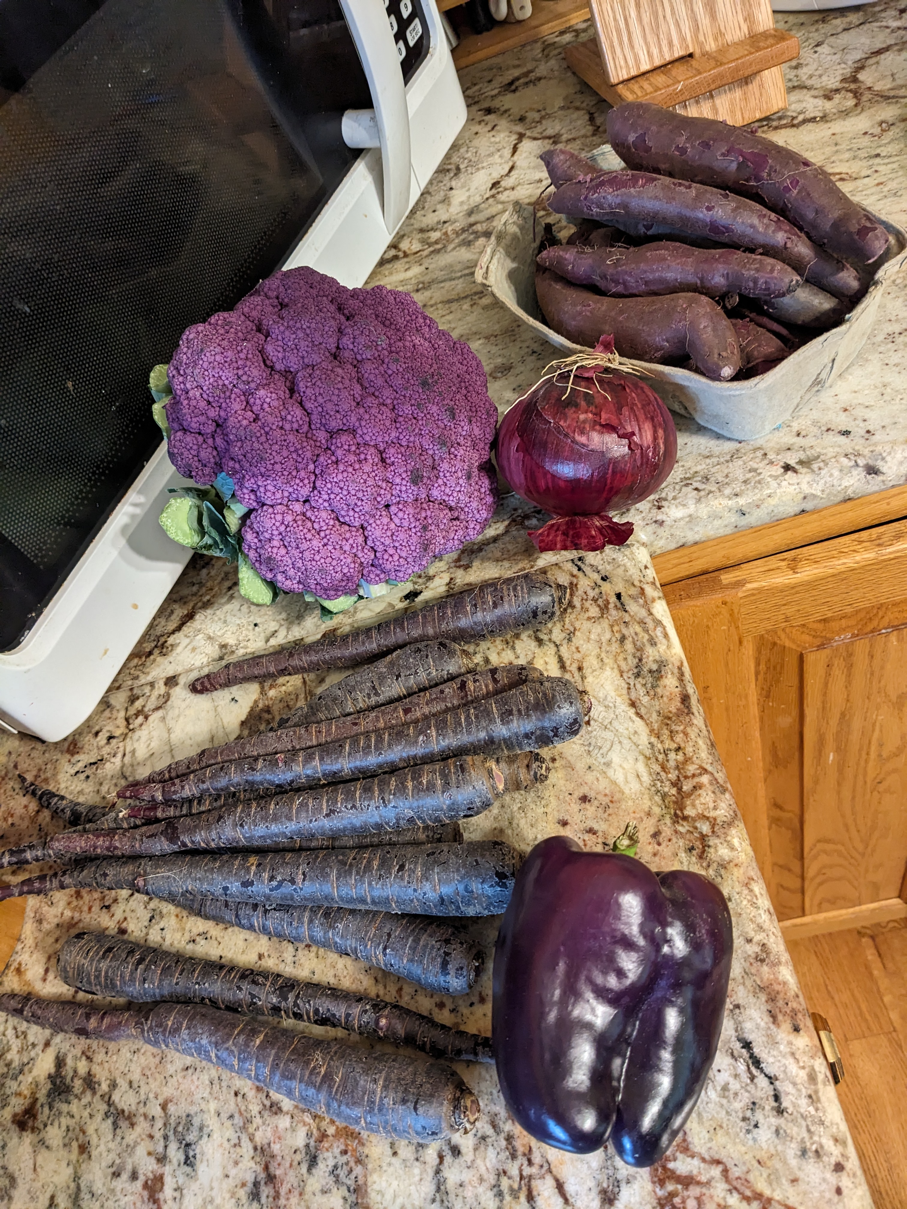 all of the raw purple veggies